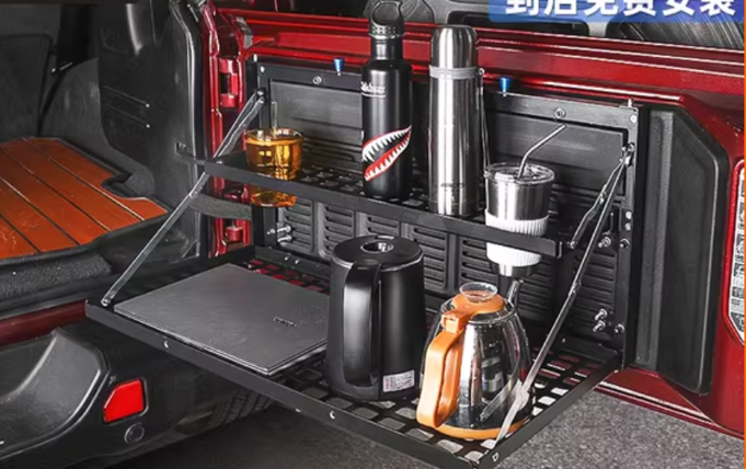 Foldable tailgate table